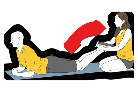 Curl femoral boca abajo con resistencia de compañero