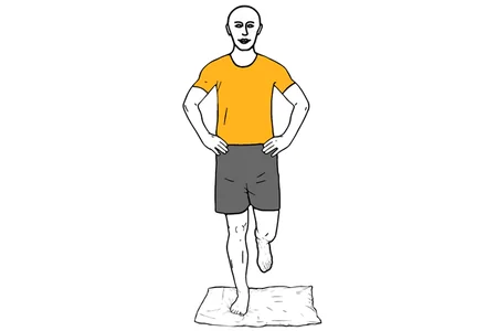 Equilibrio a una pierna sobre almohada