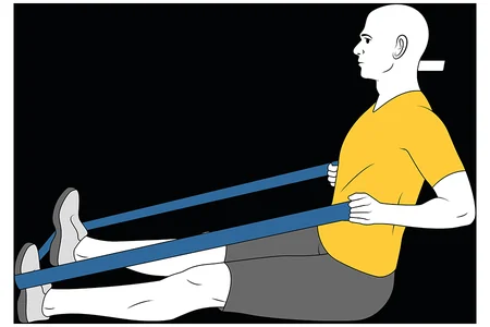 Remo con banda elastica sentado en el suelo