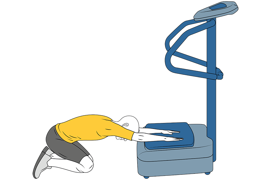 Brazo y dorso de la mano apoyado sobre plataforma vibratoria