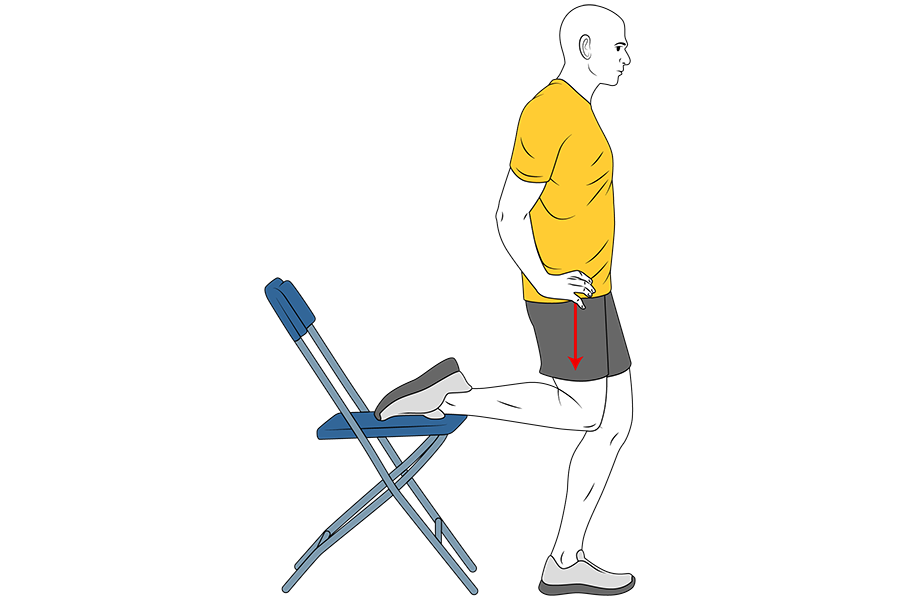 Estiramiento de cuadriceps con silla