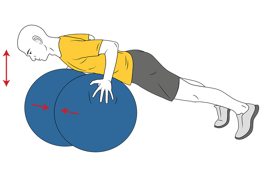 Flexiones de brazos sobre dos pelotas de pilates juntas